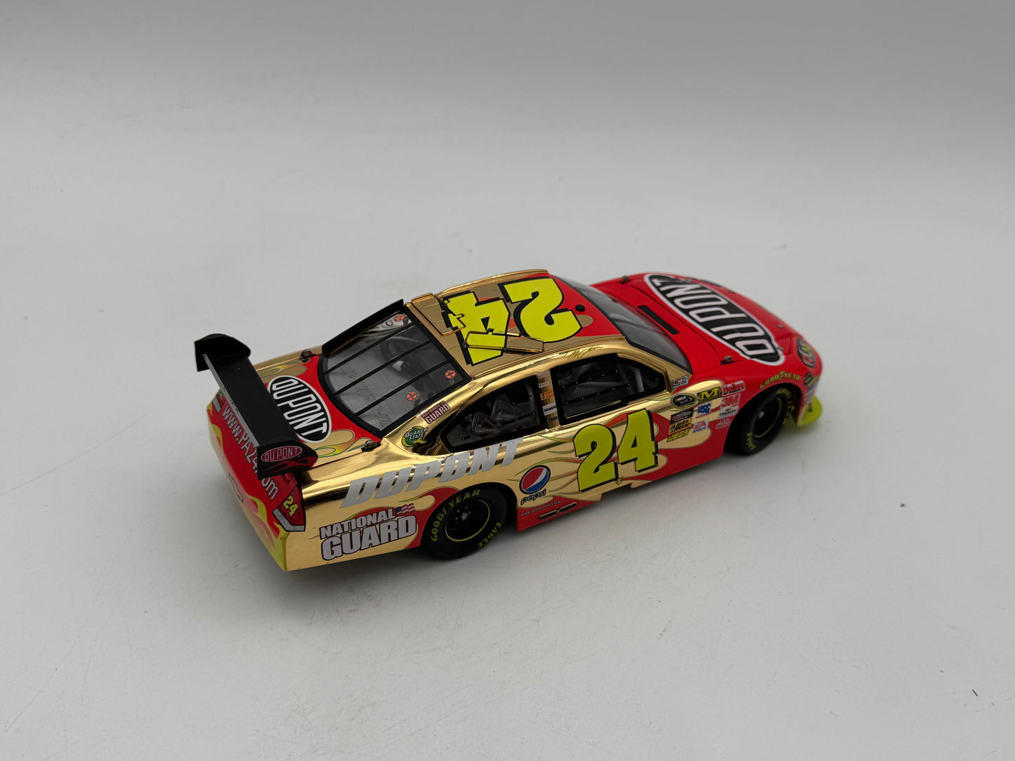 Item F756 - Jeff Gordon #24 2010 Dupont Gold Chrome *No Box*