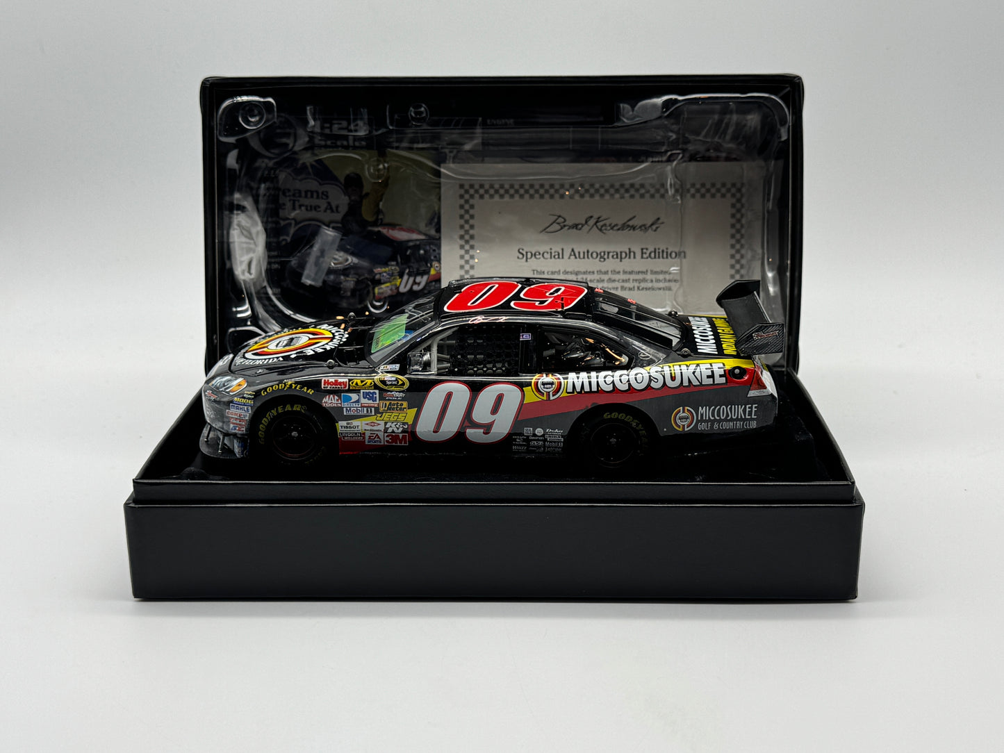 Item G387 - Brad Keselowski #09 Miccosukee Talladega Win 09 Impala SS Autographed Elite