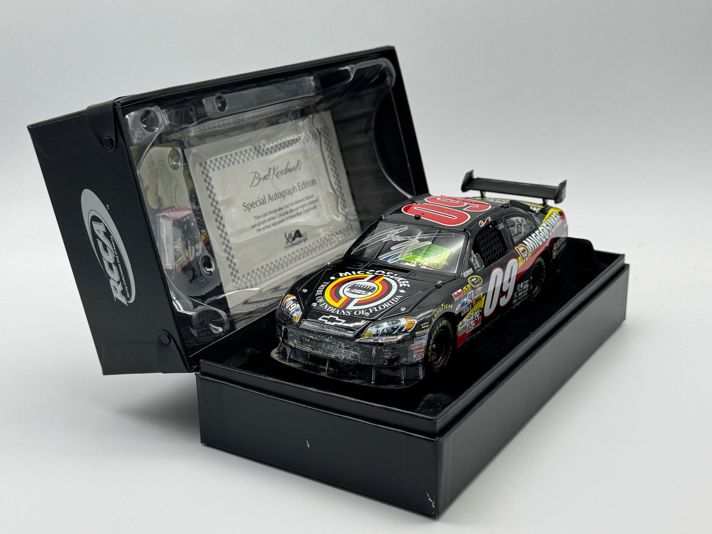 Item G387 - Brad Keselowski #09 Miccosukee Talladega Win 09 Impala SS Autographed Elite
