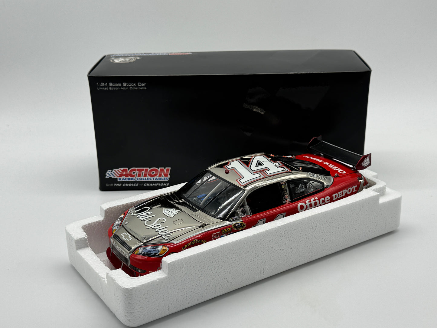 Item G450 - TONY STEWART #14 OLD SPICE 2010 IMPALA POLISHED NICKEL **Din 8**
