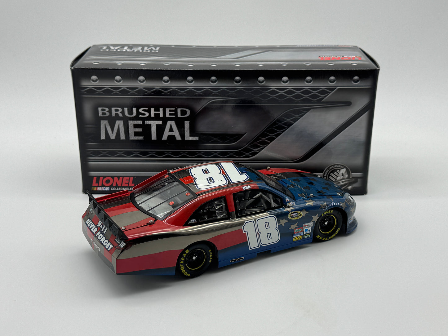 Item G471 - Kyle Busch #18 M&M's Red White & Blue 9/11 Tribute 2011 Camry Brushed Metal