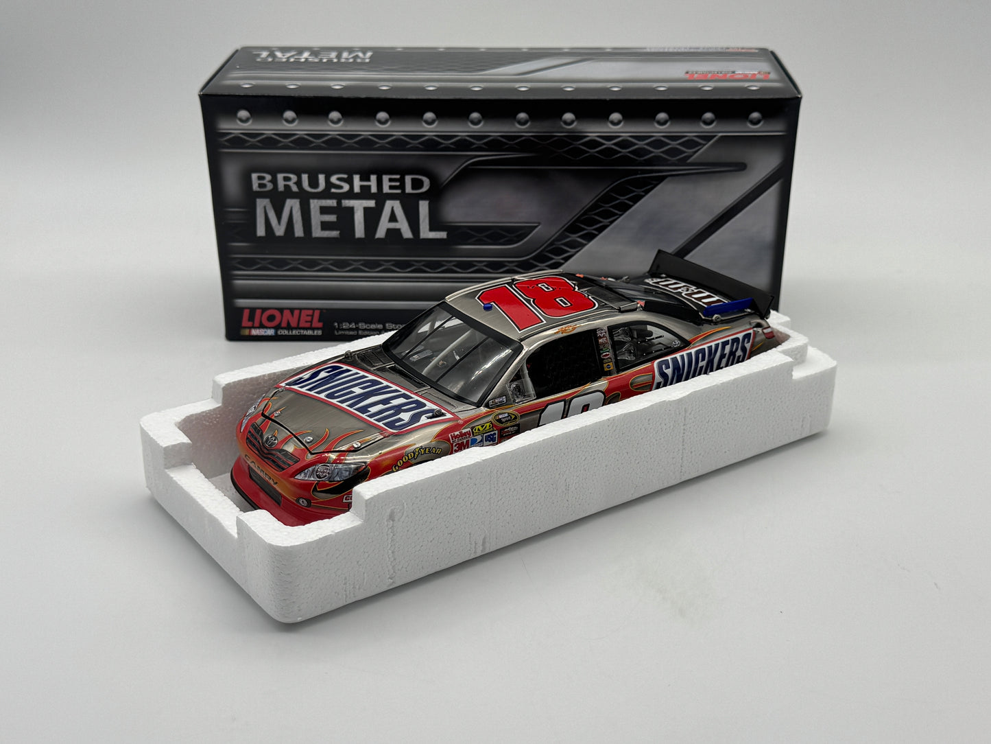 Item J830 - Kyle Busch #18 Snicker's 2011 Camry Brushed Metal **Din 5**
