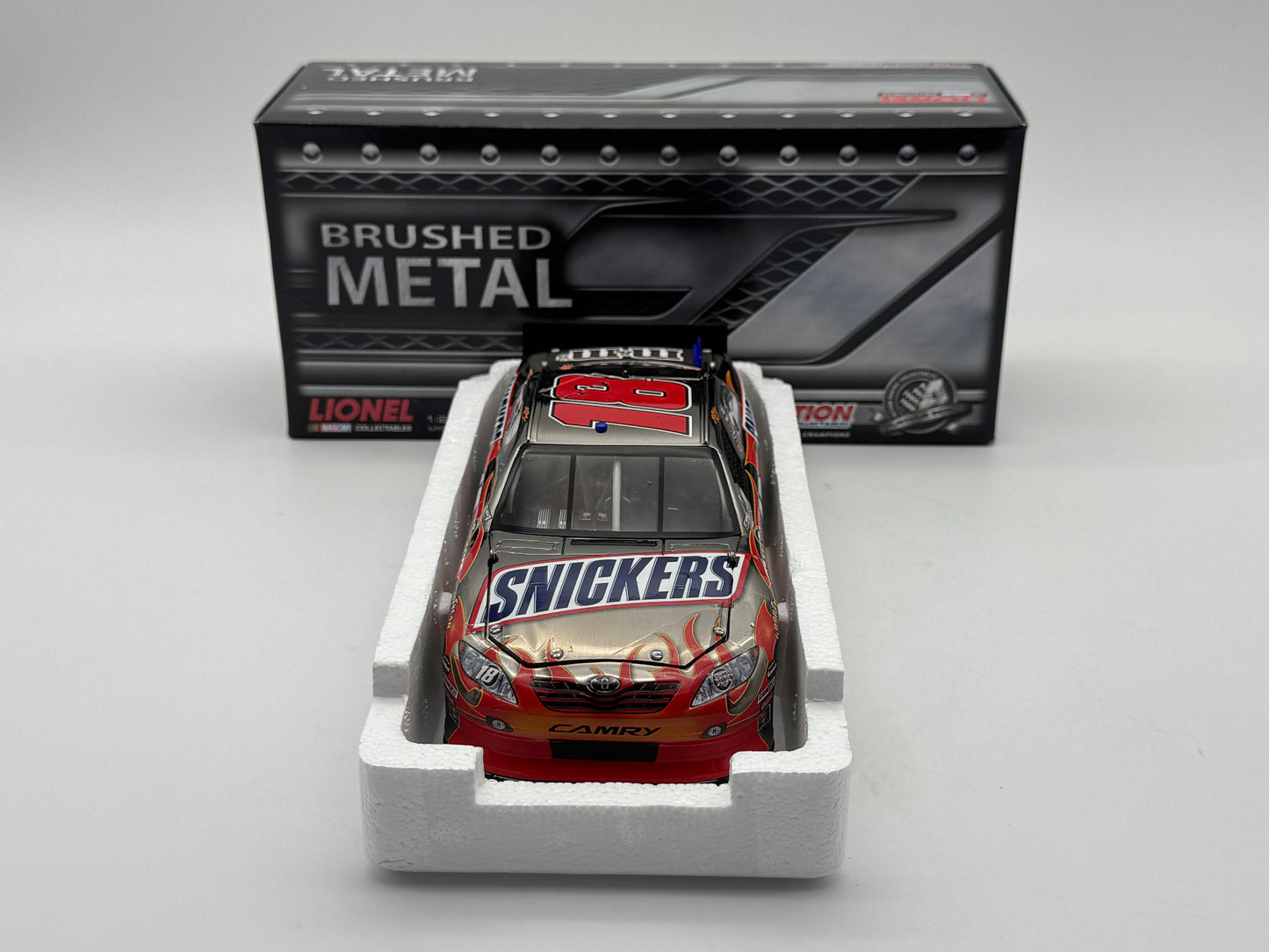 Item J830 - Kyle Busch #18 Snicker's 2011 Camry Brushed Metal **Din 5**