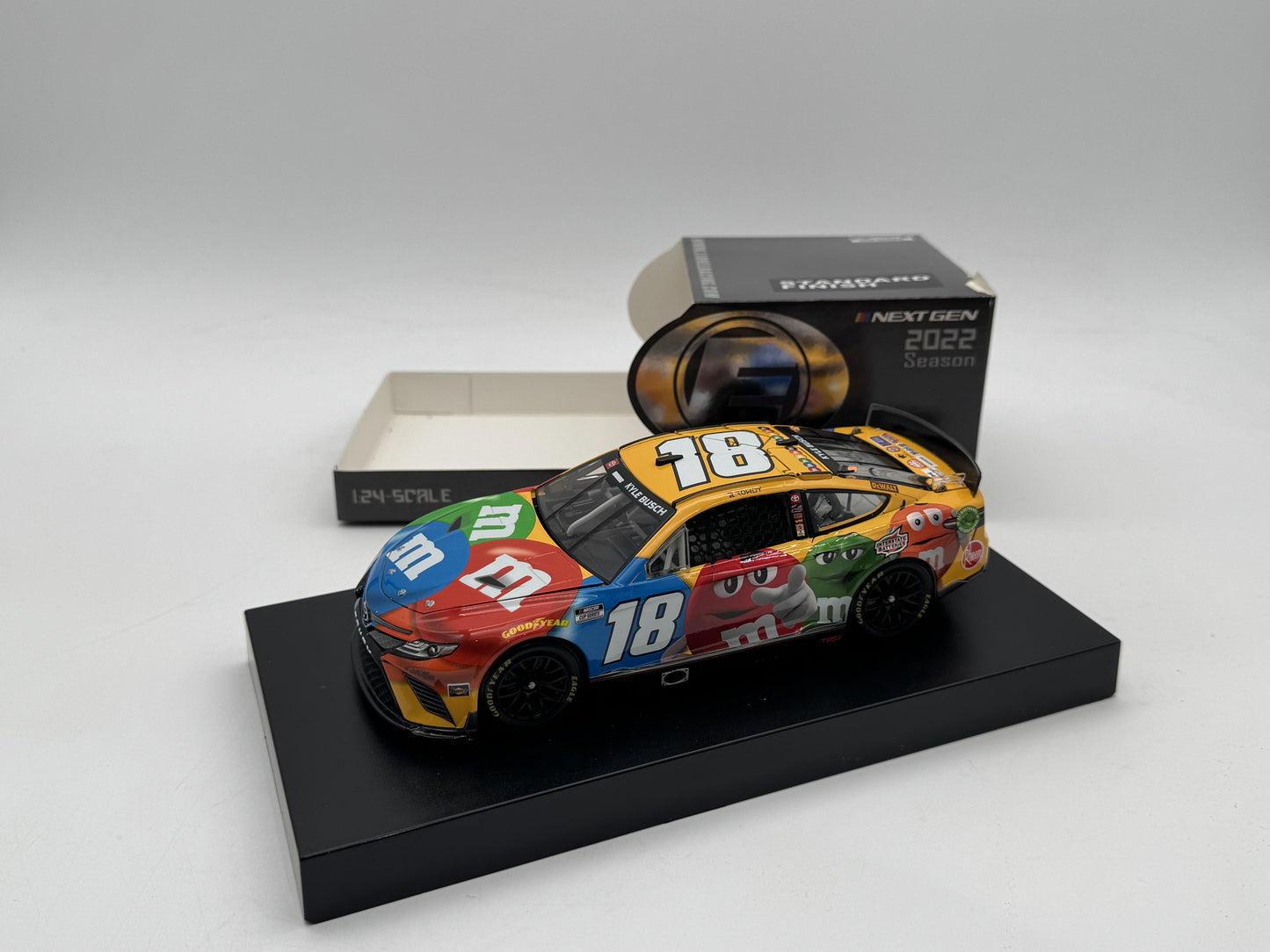 Item F433 - Kyle Busch #18 M&M'S 2022 Camry Elite **BOX DMG**
