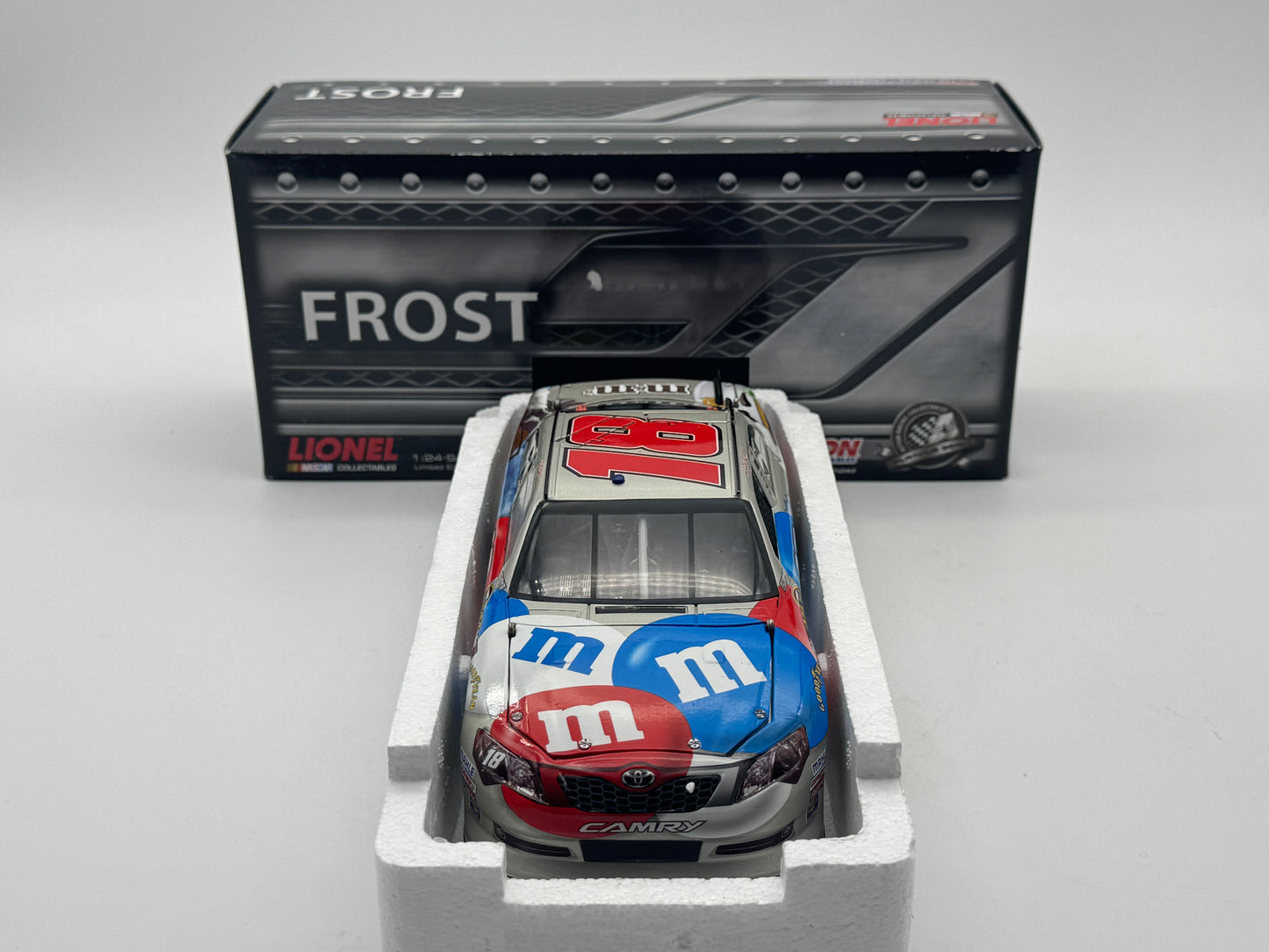 B - Item J902 - Kyle Busch #18 M&M's Red, White & Blue 2012 Camry Frost