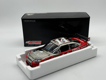 Item G450 - TONY STEWART #14 OLD SPICE 2010 IMPALA POLISHED NICKEL **Din 8**