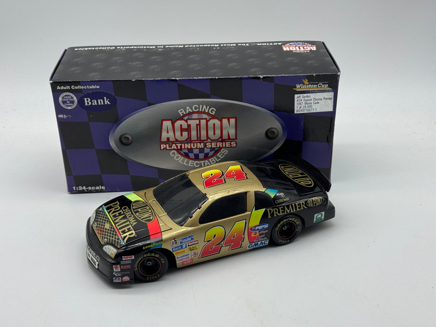 Item H448 - Jeff Gordon #24 Dupont Chroma Premier 1997 Monte Carlo Bank
